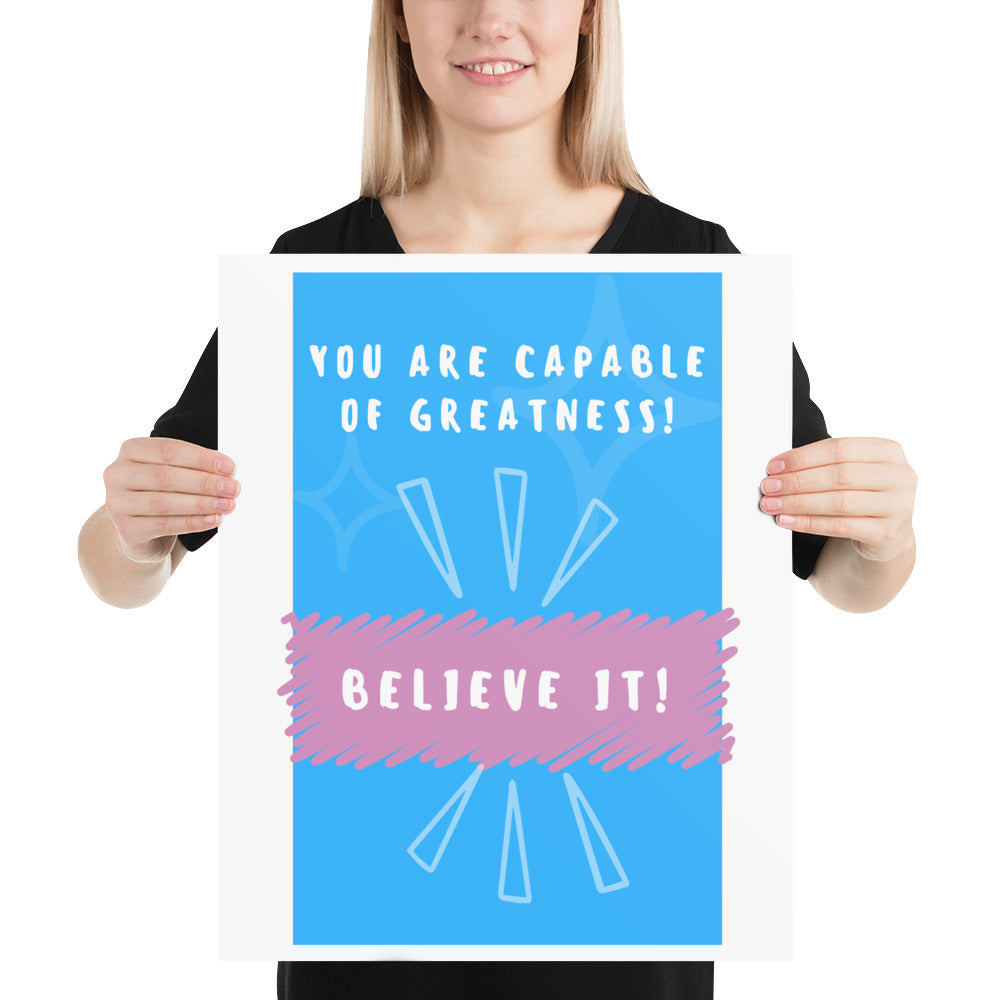 Front facing blue with pink stripe thin canvas wall decor with the phrase, You are capable of greatness! Believe it!. Size 16x20 inches.