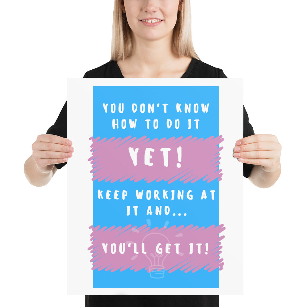 Front facing blue with pink stripe thin canvas wall decor with the phrase, You don't know how to do it yet! Keep working at it and...you'll get it. Size 16x20 inches.