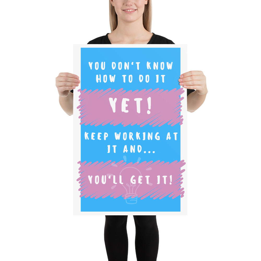 Front facing blue with pink stripe thin canvas wall decor with the phrase, You don't know how to do it yet! Keep working at it and...you'll get it. Size 20x30 inches.