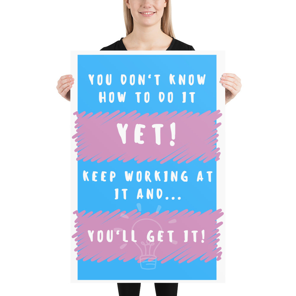 Front facing blue with pink stripe thin canvas wall decor with the phrase, You don't know how to do it yet! Keep working at it and...you'll get it. Size 24x36 inches.