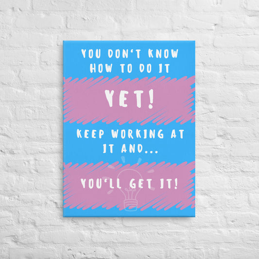 Front facing pink and blue striped thin canvas wall decor with the phrase You don't know how to do it yet! Keep working at it and...you'll get it. Size 24x32 inches.